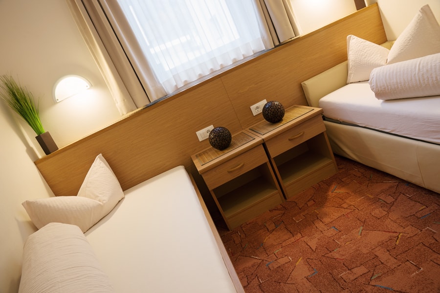 Einzelbetten f&uuml;r Gruppenreisen in der Residence Daniela